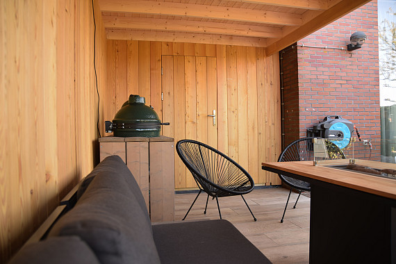 Onder deze veranda zit u goed
